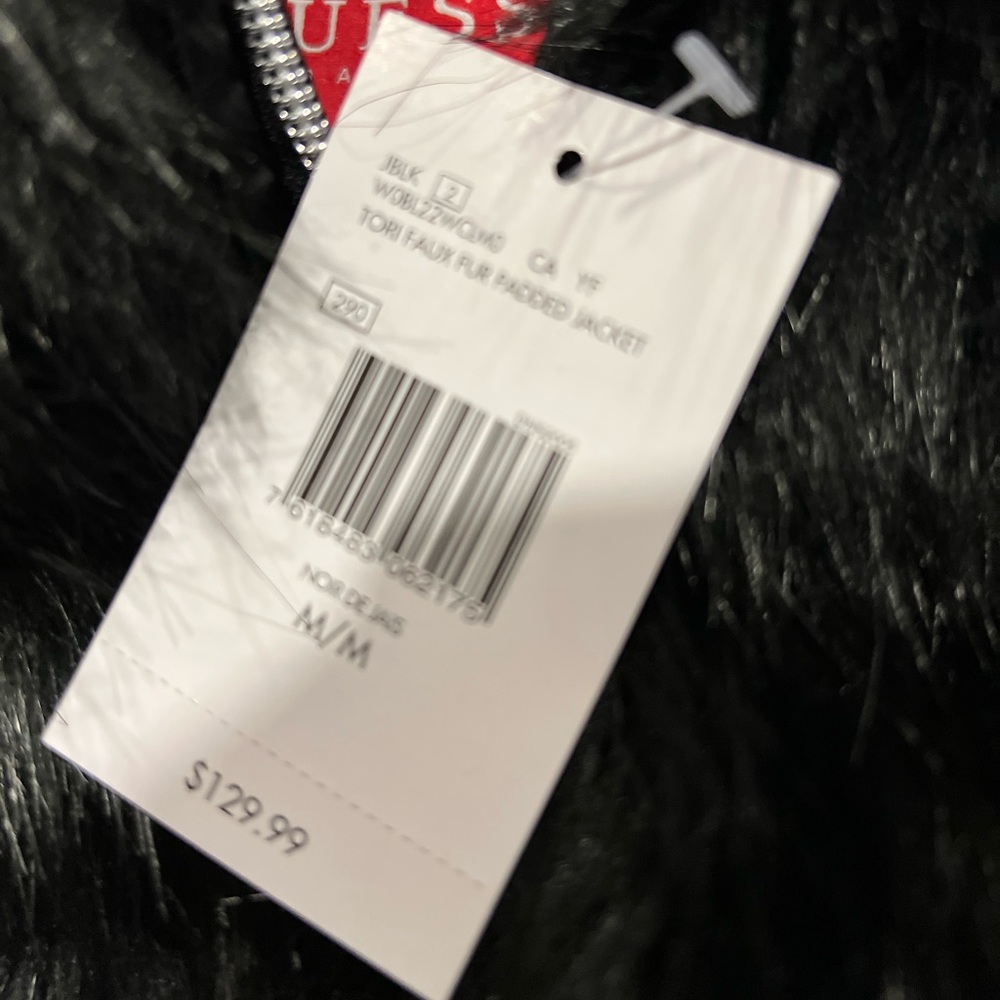 Super cute GUESS coat. Brand new. This is a size medium and true to size.